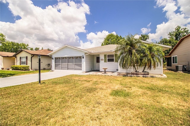 4976 Pleasant Hollow Trl, Lakeland, FL 33811 - single story home with concrete driveway, cooling unit, a front yard, and a garage