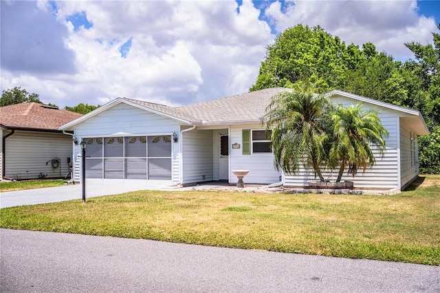 4976 Pleasant Hollow Trl, Lakeland, FL 33811 - ranch-style home featuring a garage, driveway, and a front yard