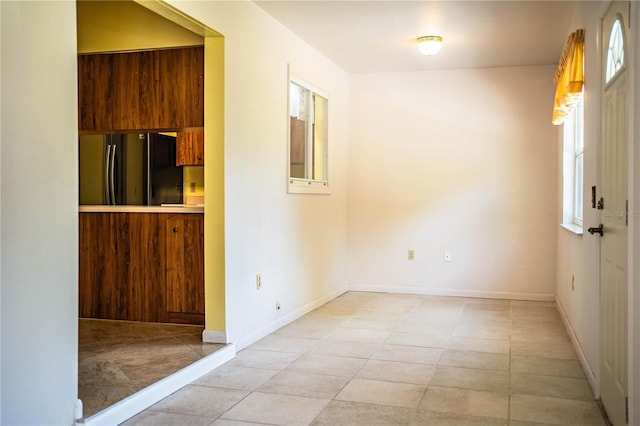 4976 Pleasant Hollow Trl, Lakeland, FL 33811 - unfurnished room featuring baseboards and light tile patterned floors