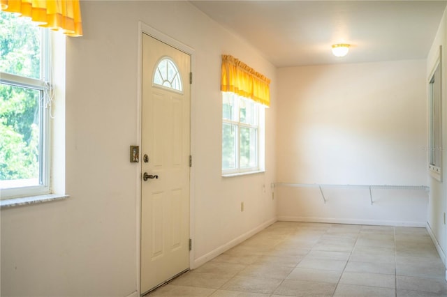 4976 Pleasant Hollow Trl, Lakeland, FL 33811 - foyer featuring baseboards and light tile patterned flooring