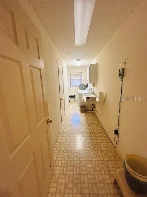 hall with brick patterned floor