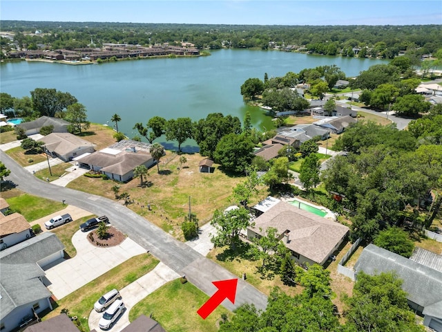 aerial view with a residential view and a water view