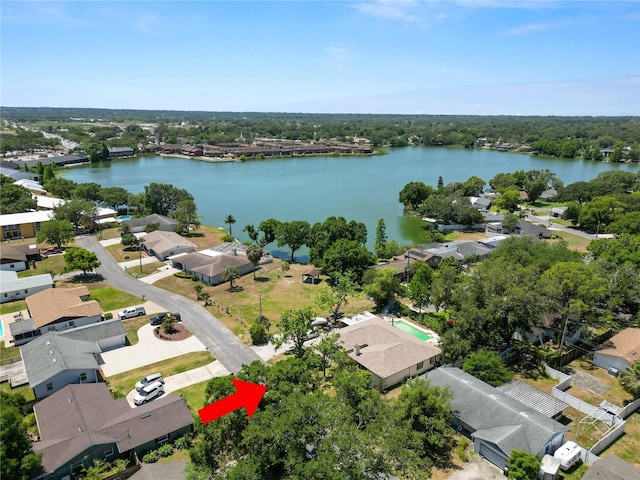 bird's eye view featuring a water view and a residential view