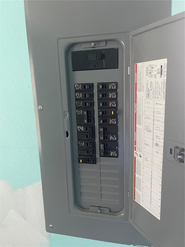 utility room with electric panel