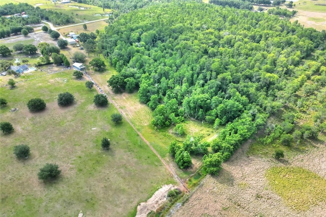 birds eye view of property with a rural view