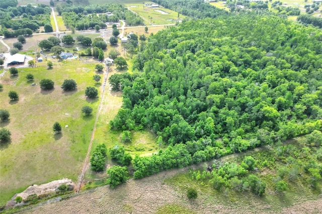 birds eye view of property featuring a rural view