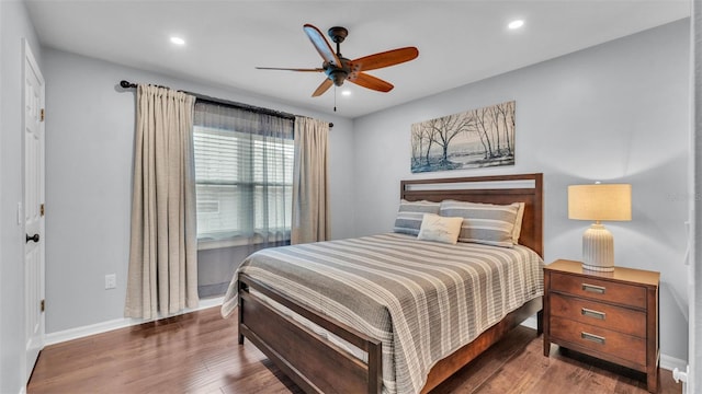 bedroom featuring recessed lighting, baseboards, and wood finished floors