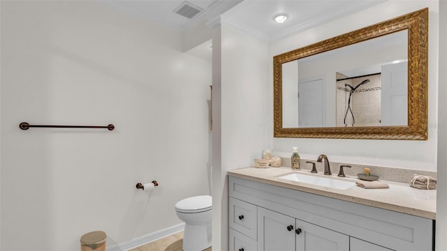 bathroom featuring visible vents, vanity, baseboards, toilet, and ornamental molding