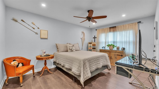 bedroom featuring recessed lighting, baseboards, and wood finished floors