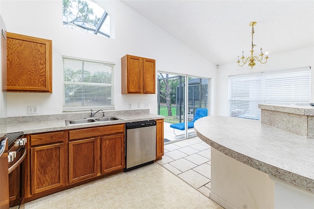 2660 Hemingway Ave, Haines City, FL 33844 - kitchen featuring a sink, stainless steel appliances, brown cabinets, high vaulted ceiling, and a healthy amount of sunlight