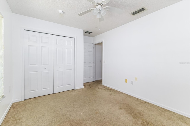 2660 Hemingway Ave, Haines City, FL 33844 - unfurnished bedroom with carpet, visible vents, and baseboards