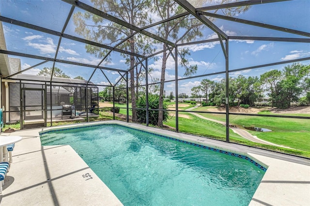 2660 Hemingway Ave, Haines City, FL 33844 - outdoor pool featuring a lawn, a patio area, glass enclosure, and view of golf course