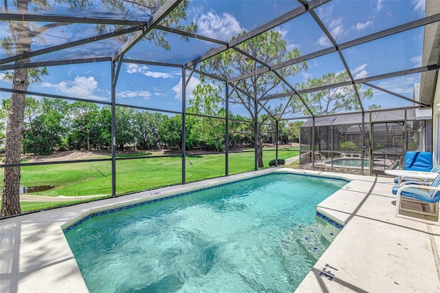 2660 Hemingway Ave, Haines City, FL 33844 - pool with a hot tub, a lanai, a patio, and a yard