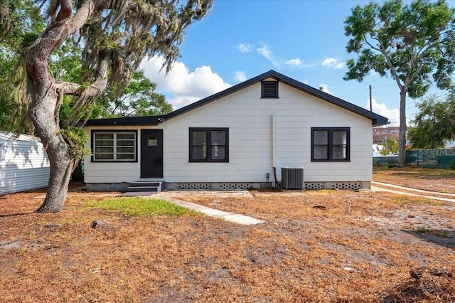 view of front of house featuring crawl space, entry steps, and central AC