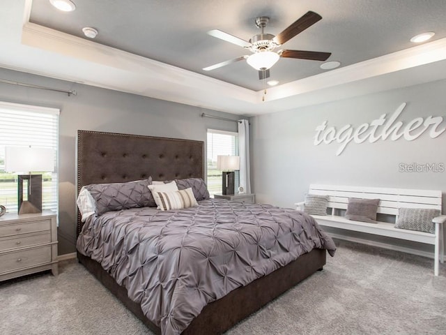1429 Fleur Dr, Davenport, FL 33837 - bedroom featuring ornamental molding, carpet, a tray ceiling, and recessed lighting