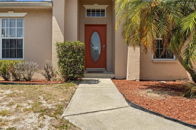 2812 Hickory Ridge Dr, Lakeland, FL 33813 - doorway to property with stucco siding