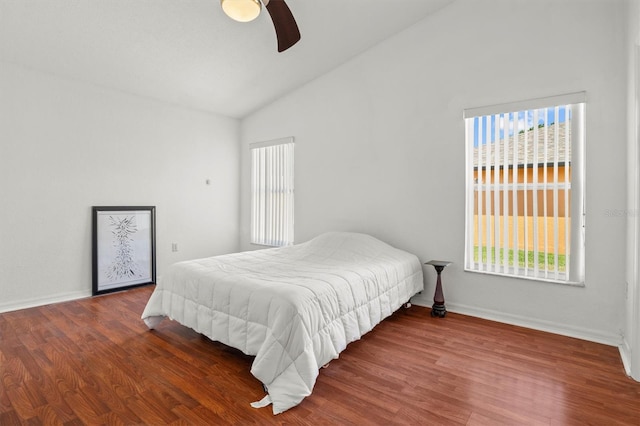 2812 Hickory Ridge Dr, Lakeland, FL 33813 - bedroom with baseboards, wood finished floors, and high vaulted ceiling