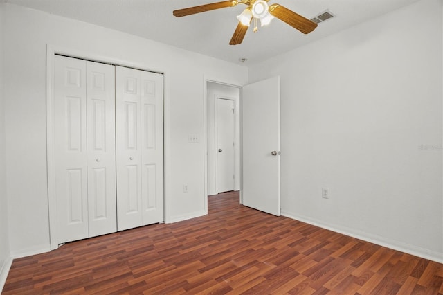 2812 Hickory Ridge Dr, Lakeland, FL 33813 - unfurnished bedroom with visible vents, a closet, wood finished floors, baseboards, and ceiling fan
