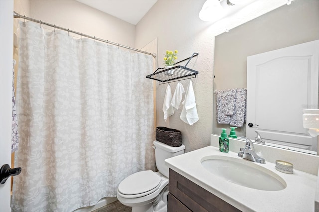 5531 Pebble Beach Dr, Lakeland, FL 33812 - bathroom featuring vanity, curtained shower, and toilet