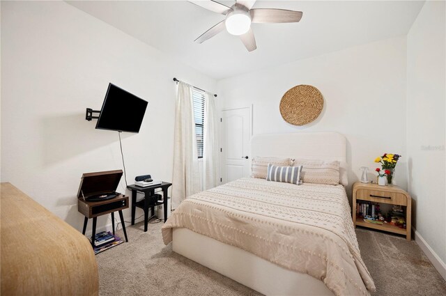5531 Pebble Beach Dr, Lakeland, FL 33812 - carpeted bedroom with a ceiling fan