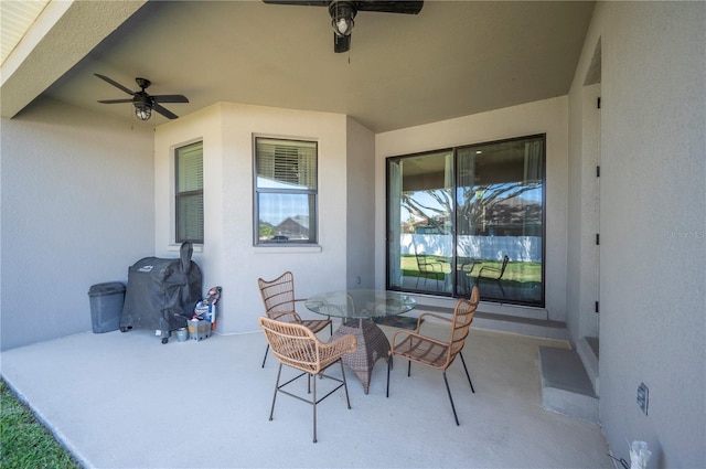 5531 Pebble Beach Dr, Lakeland, FL 33812 - view of patio with a ceiling fan, outdoor dining space, and area for grilling
