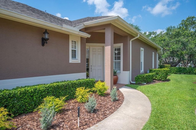 2965 Mission Lakes Dr, Lakeland, FL 33803 - entrance to property featuring stucco siding and a yard