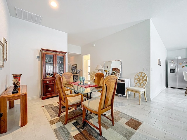 dining space featuring visible vents