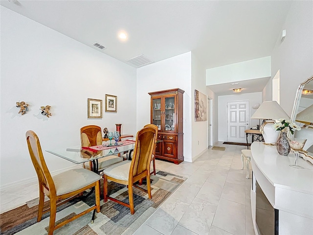 dining room with visible vents