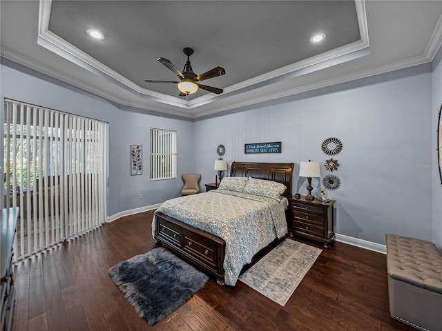 800 Osprey Landing Dr, Lakeland, FL 33813 - bedroom featuring a tray ceiling, crown molding, baseboards, hardwood / wood-style flooring, and recessed lighting