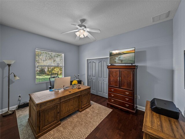 800 Osprey Landing Dr, Lakeland, FL 33813 - office area featuring ceiling fan, dark wood finished floors, baseboards, and a textured ceiling
