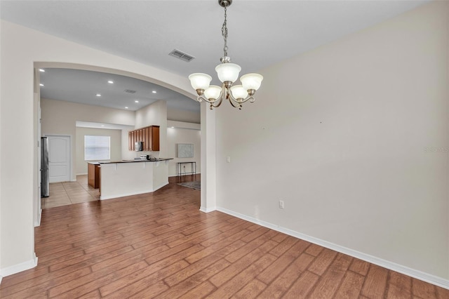 3592 Prescott Loop, Lakeland, FL 33810 - interior space featuring light wood-style floors, recessed lighting, a chandelier, and visible vents