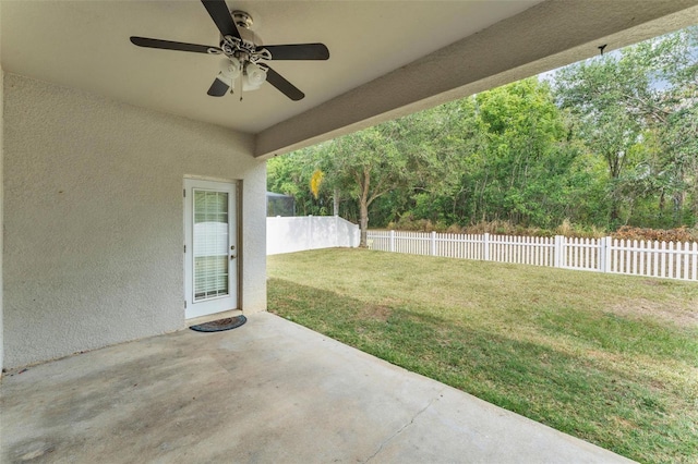 3592 Prescott Loop, Lakeland, FL 33810 - view of yard featuring ceiling fan, fence, and a patio area