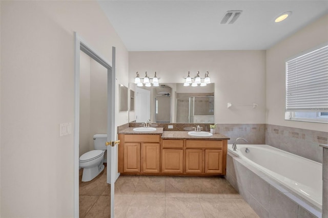 3592 Prescott Loop, Lakeland, FL 33810 - full bathroom featuring tile patterned floors, a bath, a stall shower, and a sink