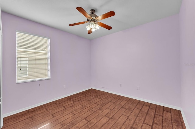 3592 Prescott Loop, Lakeland, FL 33810 - unfurnished room featuring baseboards, a ceiling fan, and wood finished floors
