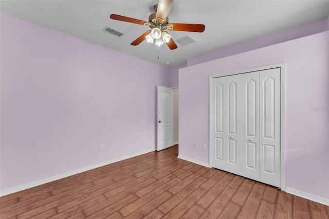 3592 Prescott Loop, Lakeland, FL 33810 - unfurnished bedroom featuring light wood-style floors, baseboards, a closet, and visible vents