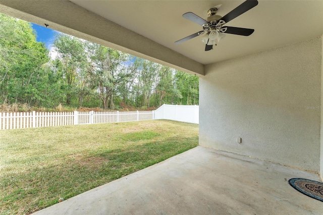 3592 Prescott Loop, Lakeland, FL 33810 - view of yard featuring a ceiling fan, a patio area, and a fenced backyard
