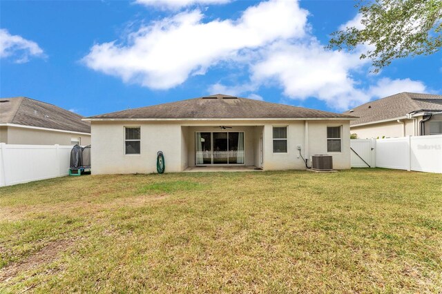 3592 Prescott Loop, Lakeland, FL 33810 - rear view of property with a fenced backyard, stucco siding, a ceiling fan, a patio area, and central air condition unit
