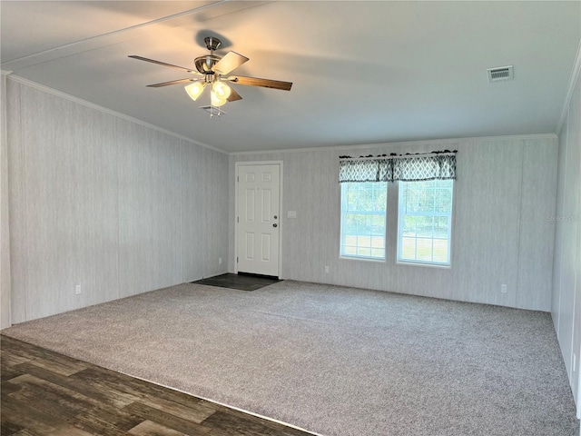 1619 N Lone Bay Blvd, Avon Park, FL 33825 - unfurnished room with ornamental molding, ceiling fan, wood finished floors, and carpet