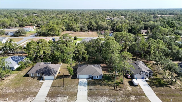 aerial view of residential area with a forest