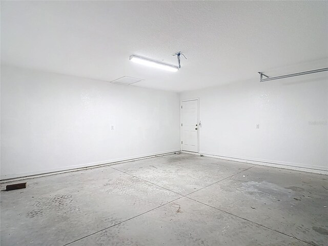 garage with baseboards