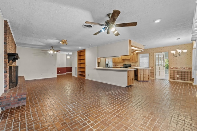 3441 Sherertz Rd, Lakeland, FL 33810 - unfurnished living room with a ceiling fan, baseboards, a brick fireplace, brick flooring, and a textured ceiling