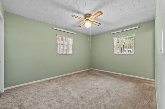 3441 Sherertz Rd, Lakeland, FL 33810 - carpeted spare room featuring a ceiling fan, baseboards, and a textured ceiling