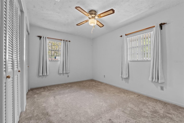 3441 Sherertz Rd, Lakeland, FL 33810 - spare room featuring carpet floors, ceiling fan, and baseboards