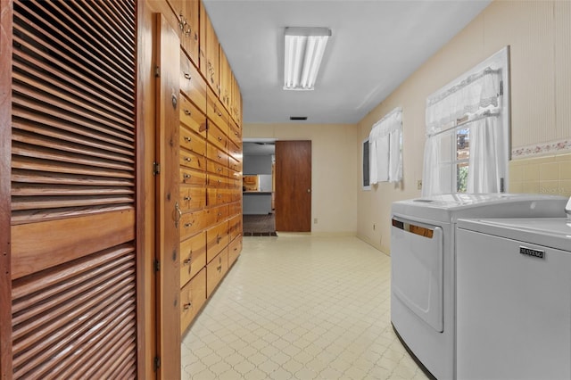 3441 Sherertz Rd, Lakeland, FL 33810 - clothes washing area featuring separate washer and dryer and light floors