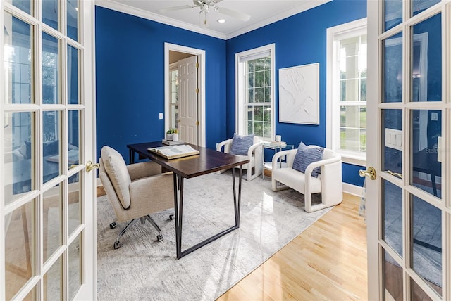 office space with ceiling fan, french doors, baseboards, wood finished floors, and ornamental molding