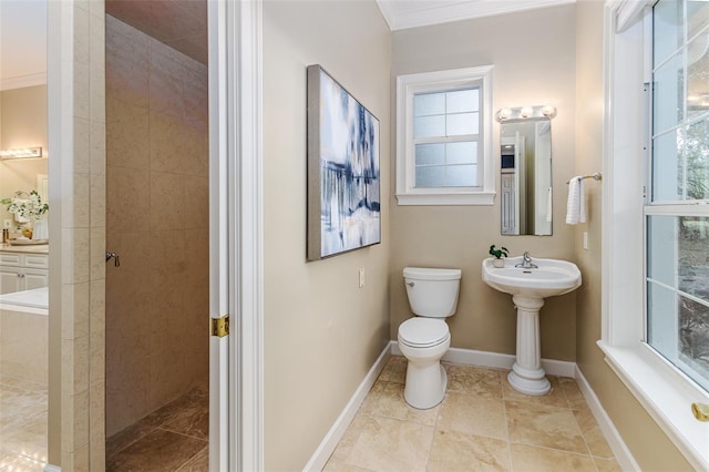 full bathroom with baseboards, crown molding, toilet, and tiled shower