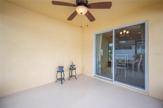 view of patio / terrace featuring ceiling fan