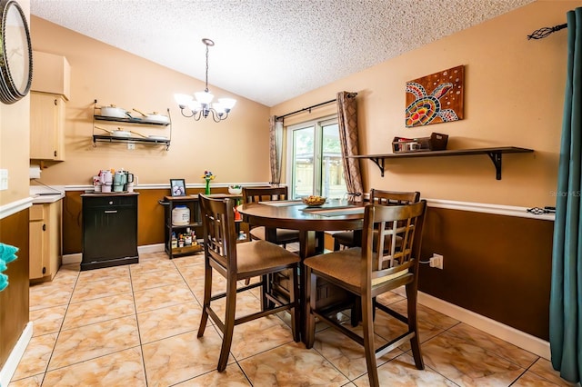 1061 Lowry Ave, Lakeland, FL 33801 - dining space with a textured ceiling, vaulted ceiling, light tile patterned floors, and a notable chandelier