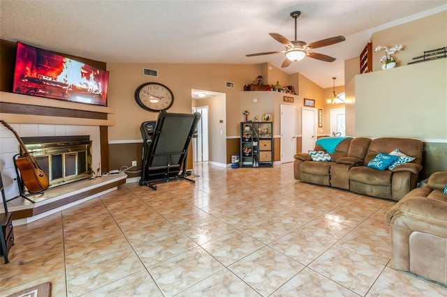 1061 Lowry Ave, Lakeland, FL 33801 - living room featuring tile patterned floors, visible vents, lofted ceiling, and ceiling fan with notable chandelier