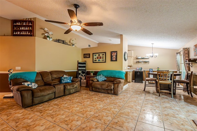 1061 Lowry Ave, Lakeland, FL 33801 - living room featuring lofted ceiling, a textured ceiling, and ceiling fan with notable chandelier